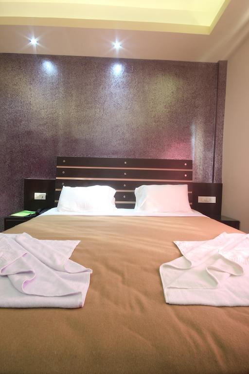 Urmee Hotel Bhubaneswar Kamer foto