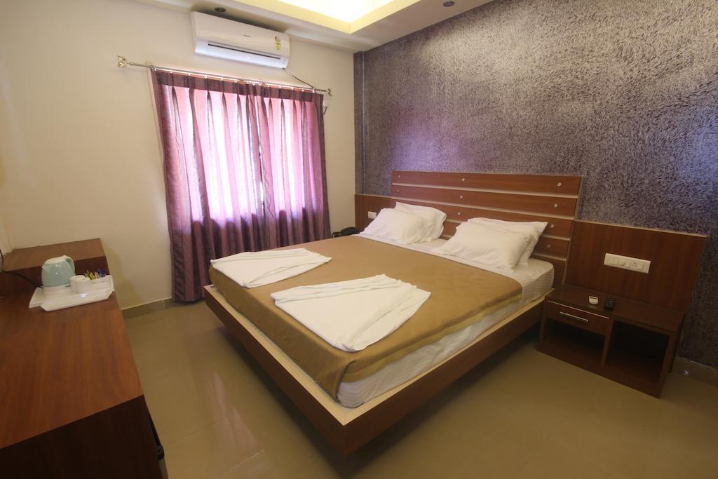 Urmee Hotel Bhubaneswar Kamer foto
