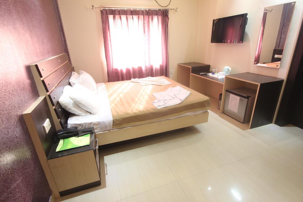 Urmee Hotel Bhubaneswar Kamer foto