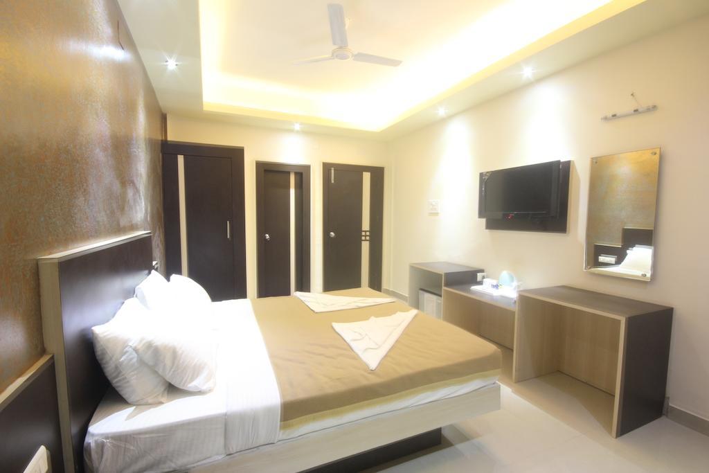 Urmee Hotel Bhubaneswar Kamer foto