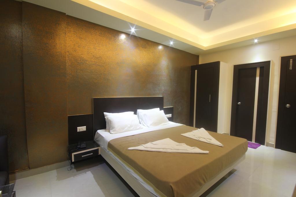 Urmee Hotel Bhubaneswar Kamer foto